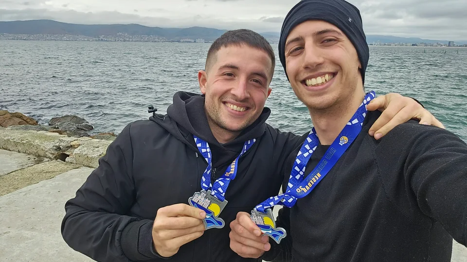 My cousin and me with our medals