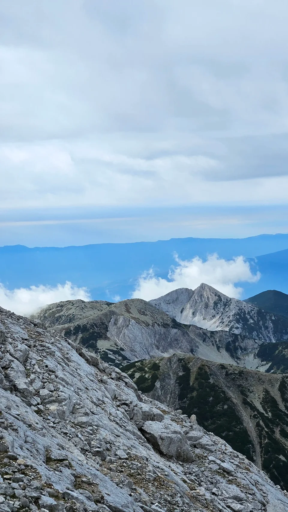 Rocky Pirin ridges beneath the clouds
