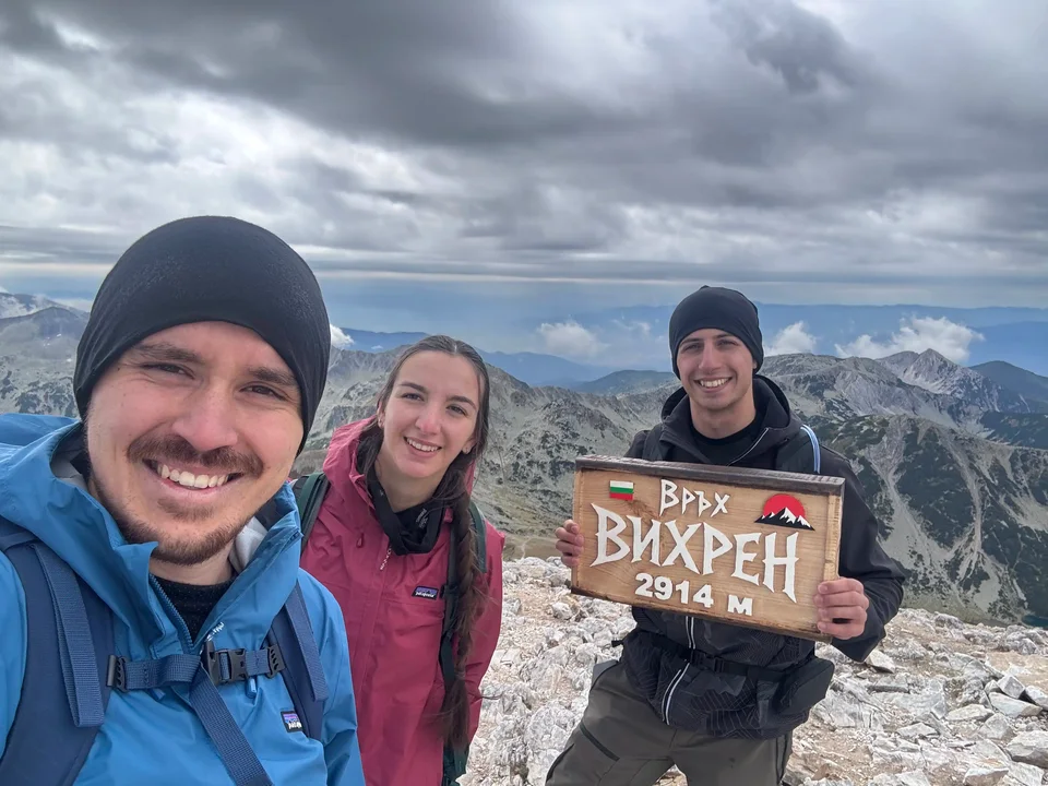 The three of us on Vihren with the summit sign