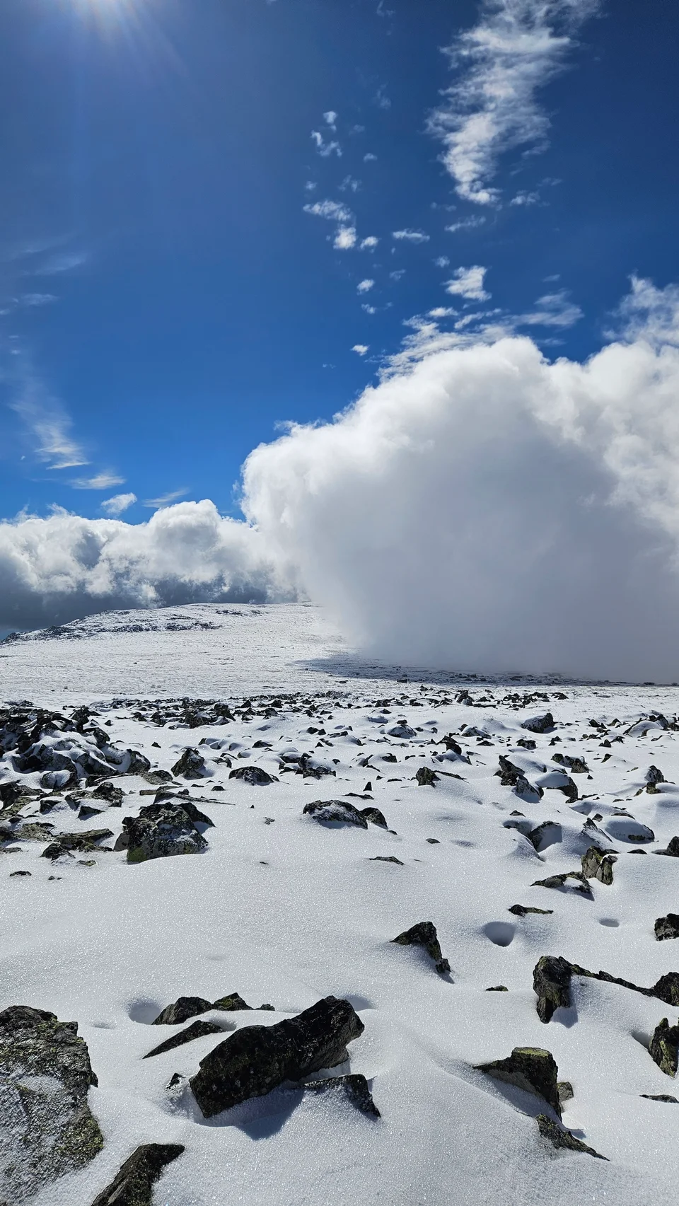 Clouds rolling over the snowy Vitosha ridge