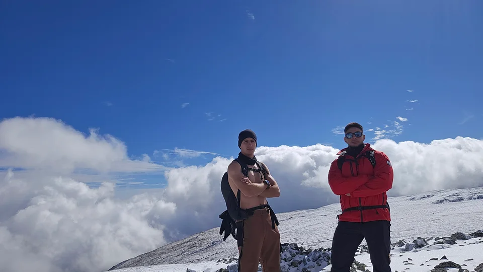 With Mishu above the clouds on snowy Vitosha